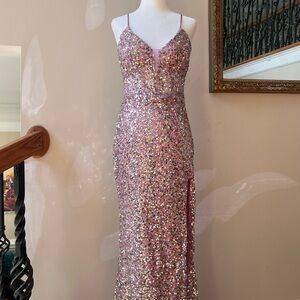 Absolutely stunning, brand new, purple pink sequins size 7 sparkling prom dress.
